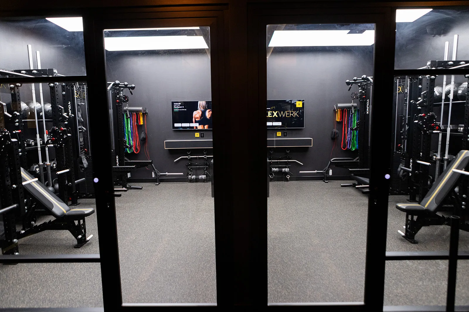Glass suite doors looking into a private FlexSpace
